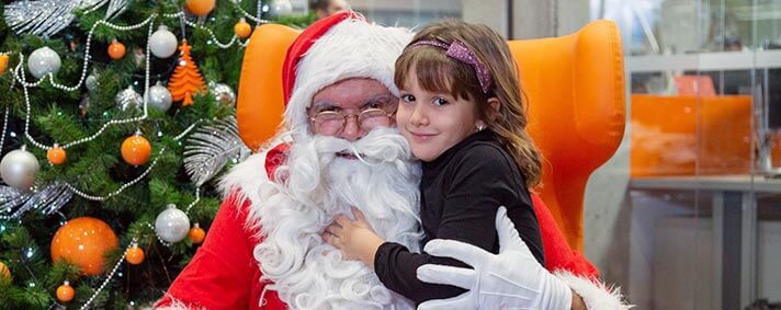 Santa Clause and little girl at Vega IT
